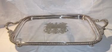Lg. silver-plate on copper two handled tray with central armorial crest & fish decoration to handles