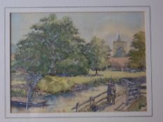 Framed watercolour depicting river scene with man in a boat size approx. 24.5cm x 18cm