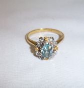 18ct gold ring set with diamonds & aquamarine/blue topaz