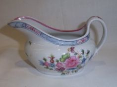 Newhall creamer decorated in the Chinese export style floral design pattern no. 593