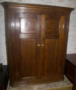 Geo. oak corner cupboard with internal shaped shelves