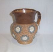 Doulton Lambeth stoneware jug with applied flowers & ribbed neck ht approx. 17.5cm