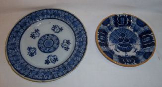 Dutch Delft plate with blue floral dec & yellow rim, the base marked BP & one other similar plate