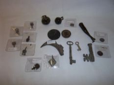 WITHDRAWN: Sel. artefacts inc. 3 keys, 5 clothes fasteners, 2 crotal bells, nutcrackers, pouring
