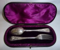 Cased silver dessert fork & spoon with bright cut engraved design depicting owls in woodland Lon.