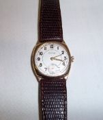 9ct gold Cyma wristwatch on leather strap