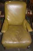 Leather armchair with retractable foot rest