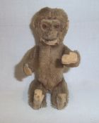 Possibly Schuco miniature monkey with internal scent bottle