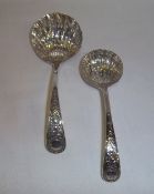 2 silver sifting spoons Sheff. 1901 & 1911 wt approx. 2.2oz