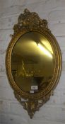 Oval gilt framed mirror