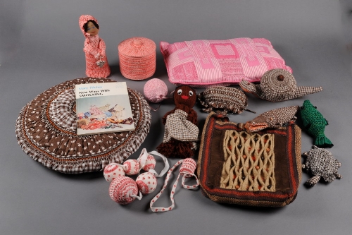 A collection of three-dimensional and other smocked items made by Mary Pilcher for her book "New