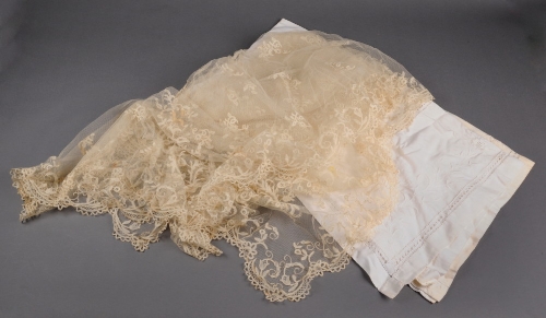 A 19th Century tulle wedding veil edged with Honiton lace with Honiton lace sprigs appliquéd