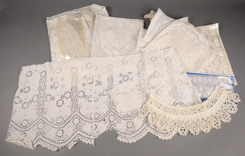 A 19th Century broderie anglaise flounce, 15" x 33" approx, a collection of broderie anglaise and
