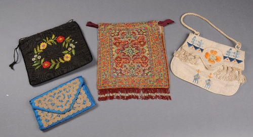 A 19th Century beaded bag, worked in a Persian carpet pattern, a 19th Century black silk bag