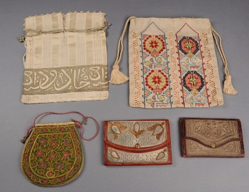 A Turkish drawstring bag made from silk decorated with a band of embroidery in metal thread