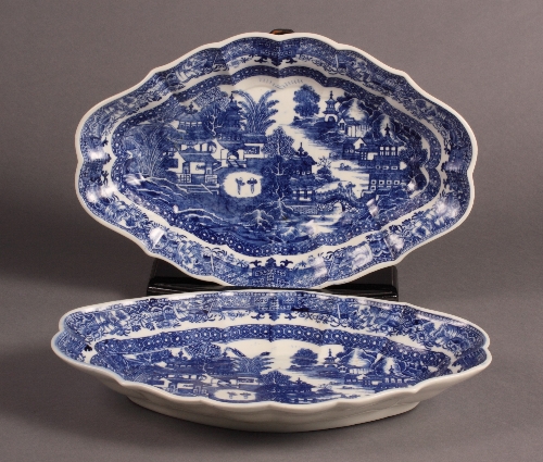 A pair of Caughley blue and white shaped oval dishes, transfer printed with pagodas in river