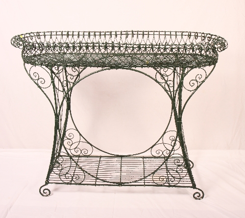 A Victorian green painted wire work two-tier plant stand