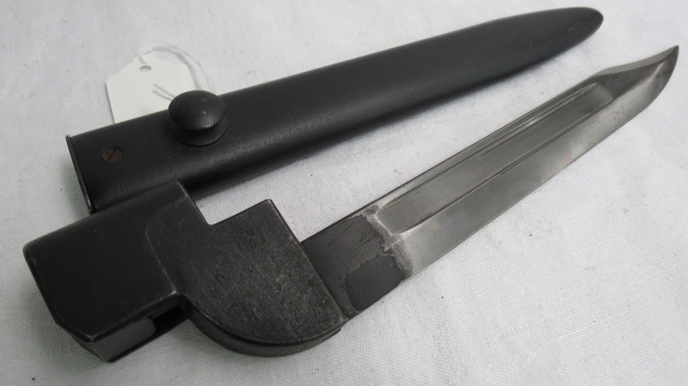 A WWII Bowie blade bayonet with scabbard to fit .303 Lee-Enfield rifle, blade length 19cm.