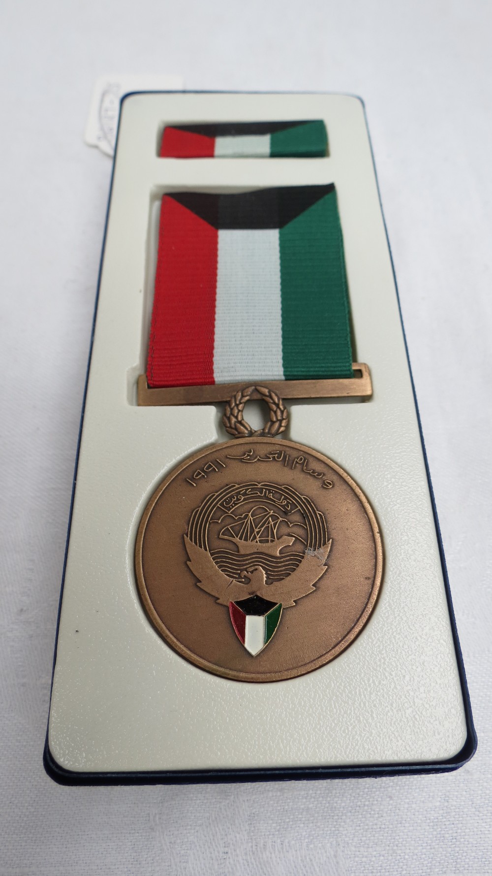 A Gulf War medal, Kuwait Liberation with box.