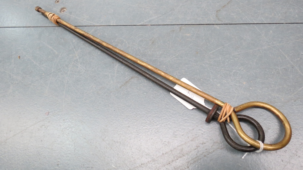 A Sten and Thompson cleaning rod, one brass.