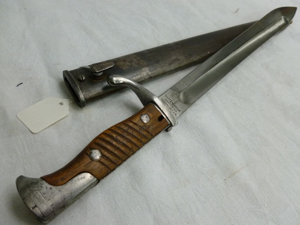 A WW-I German Prussian - 1917 Butcher Blade bayonet with scabbard. Has Waffenfabrik - Mauser A.