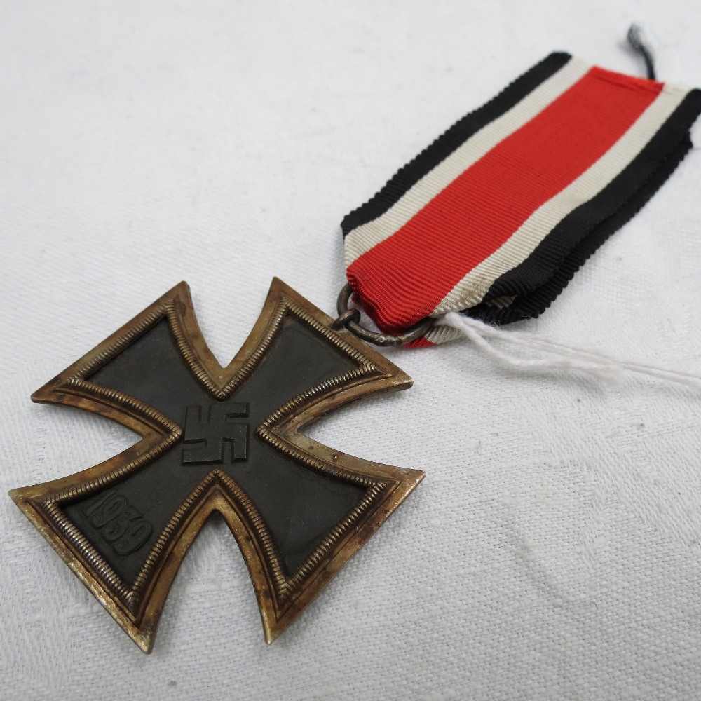 A WWII German Iron Cross, Second Class on ribbon.