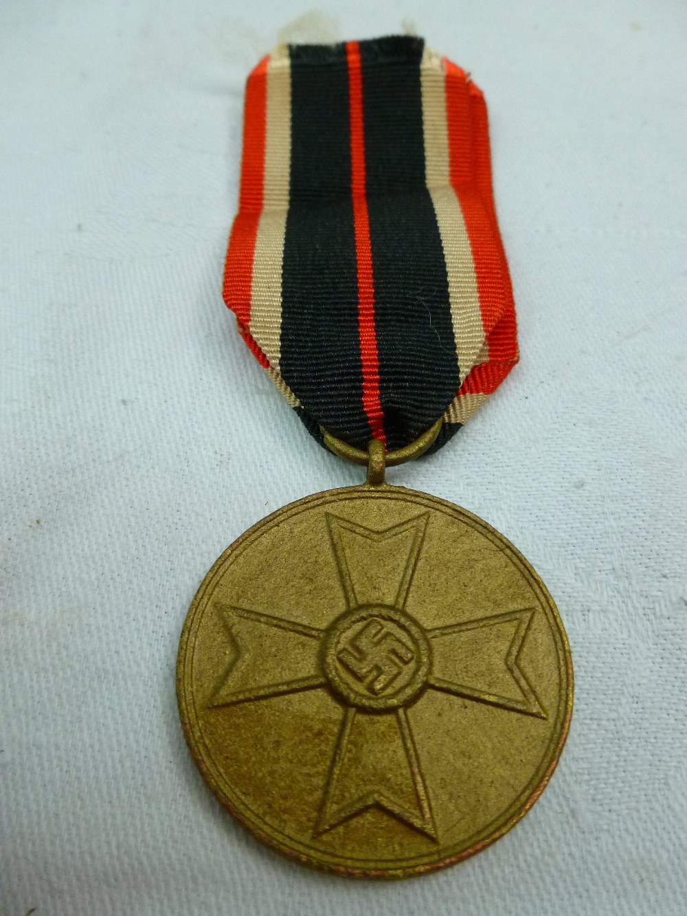 A WWII German war merit medal.