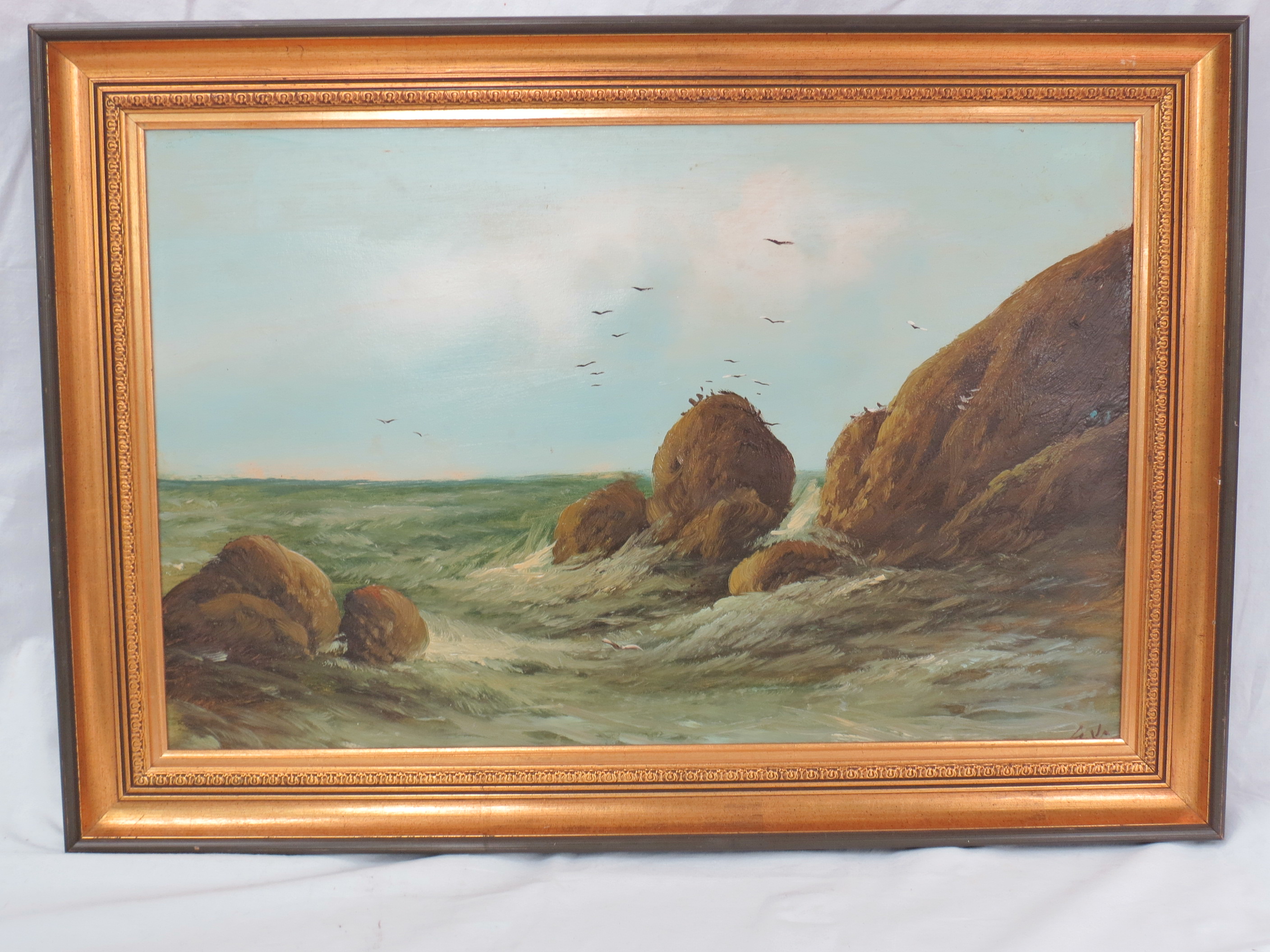 Anon. 20thC English School, Rocky Coastline, oil on panel, signed with initials indistinctly lower