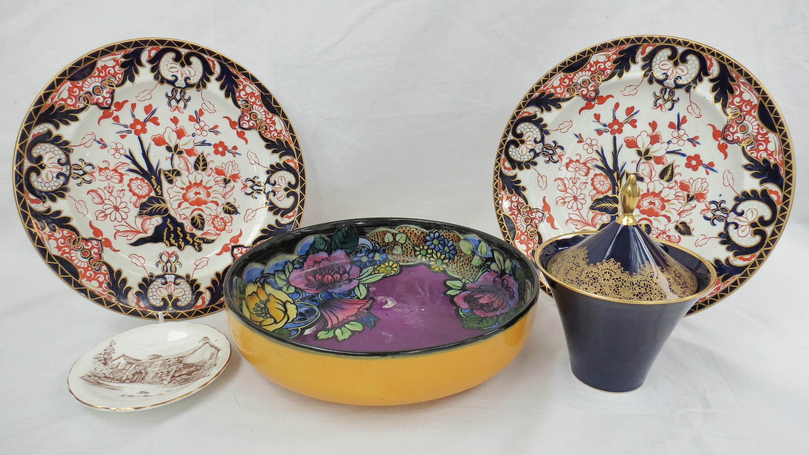 A pair of Royal Crown Derby plates dated 1887 and decorated in typical Imari pallet, together with a