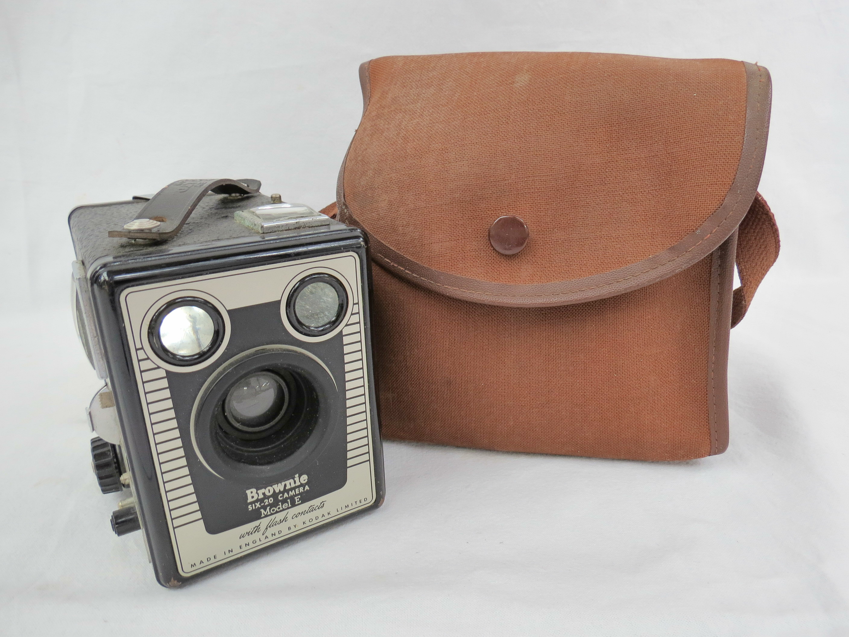 A Kodak Model E Brownie camera with canvas case.