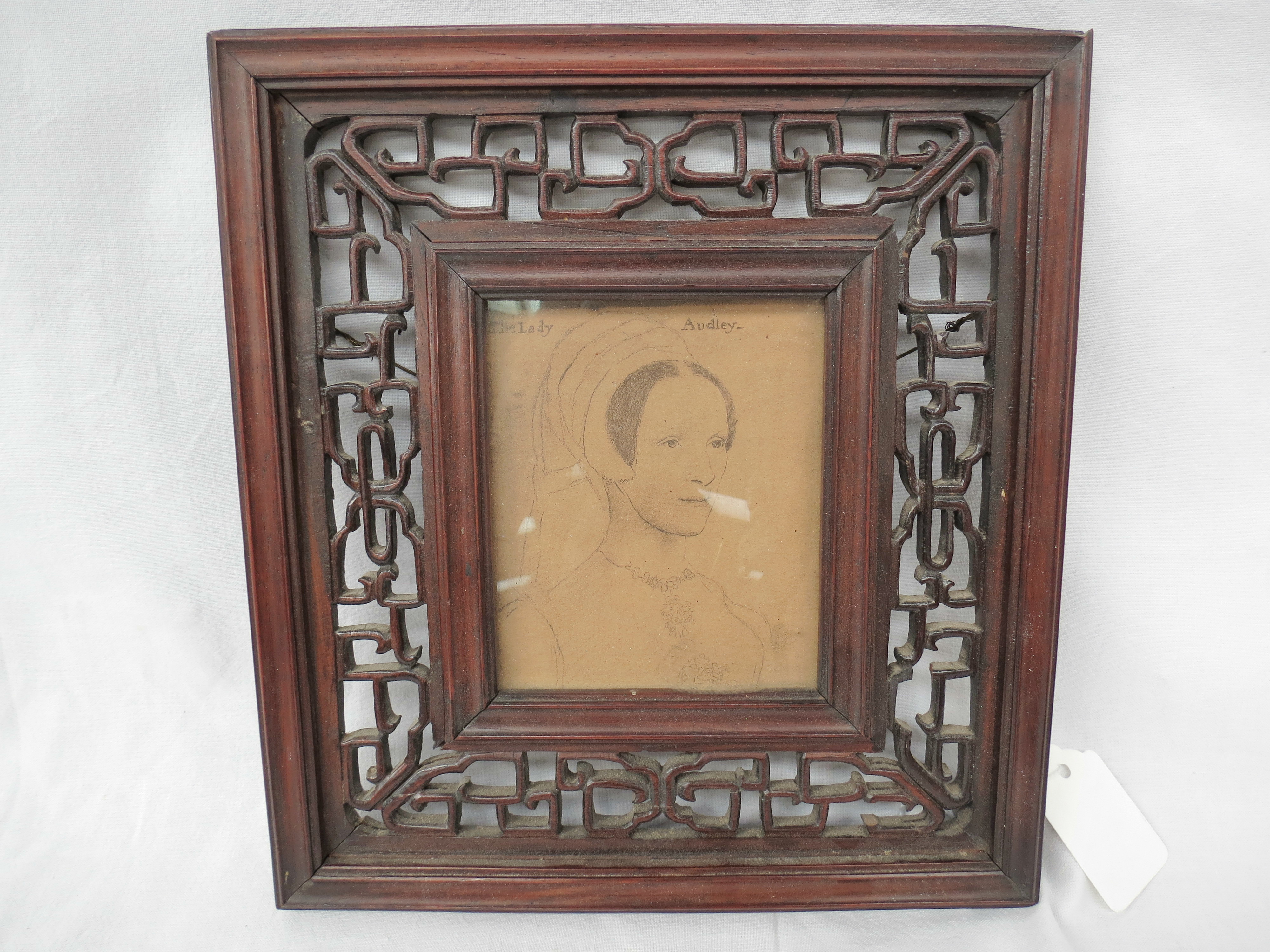 After Hans Holbein, 'The Lady Audley' in a pierced Chinese hardwood frame, 10x8cm.