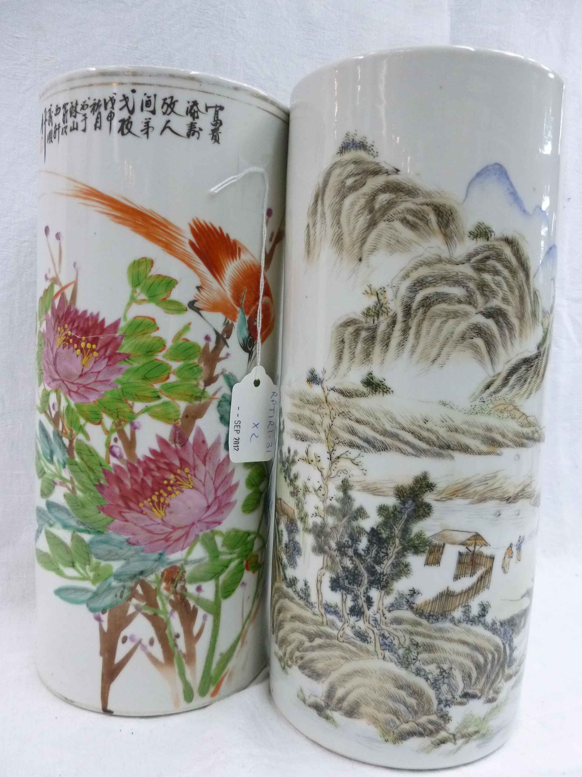 A Japanese cylinder vase with mountain scenery decoration and another with bird on blossom, 11"