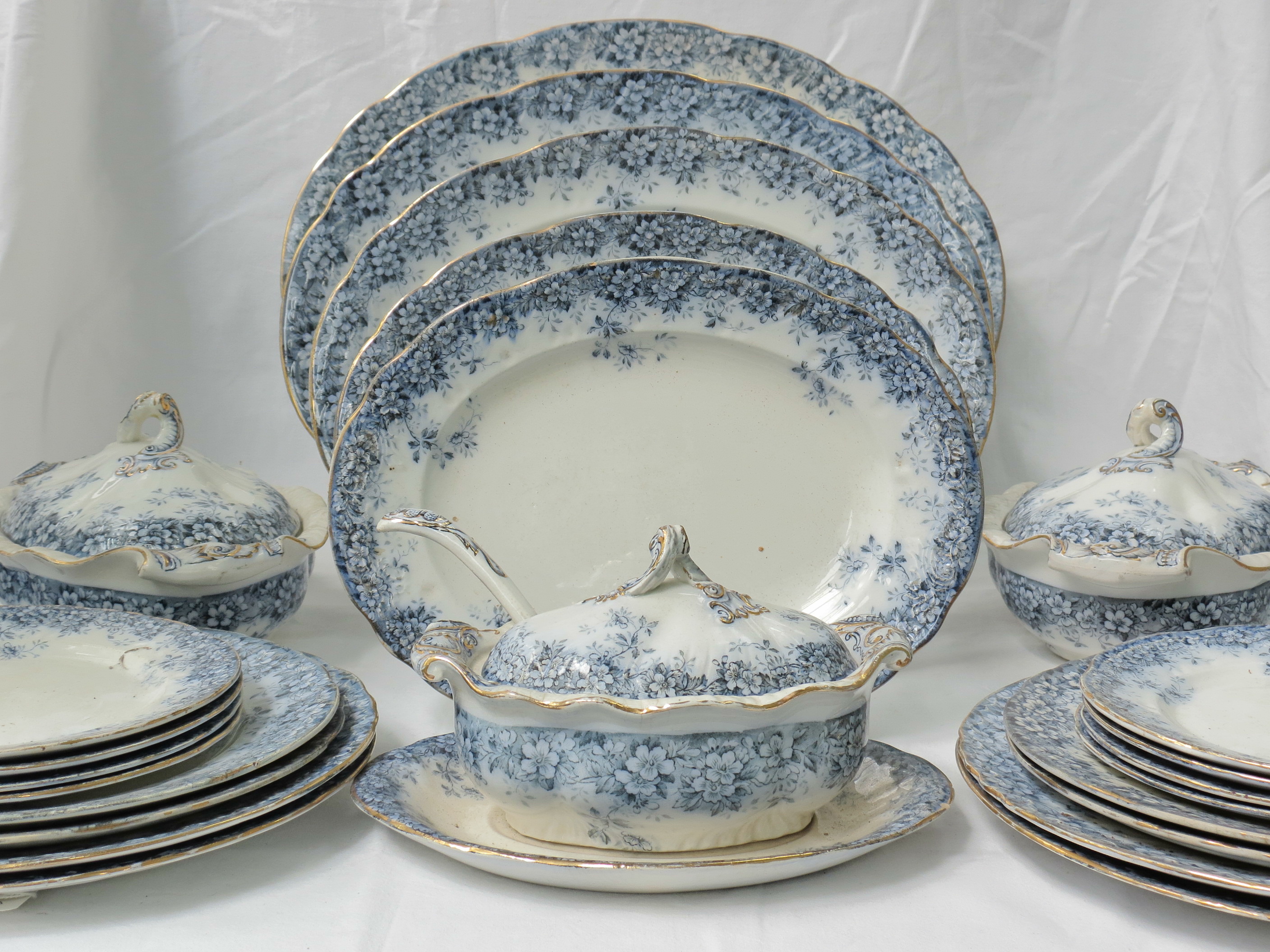 A late 19thC Boothes Canterbury pattern part dinner service, including five graduated ashettes,