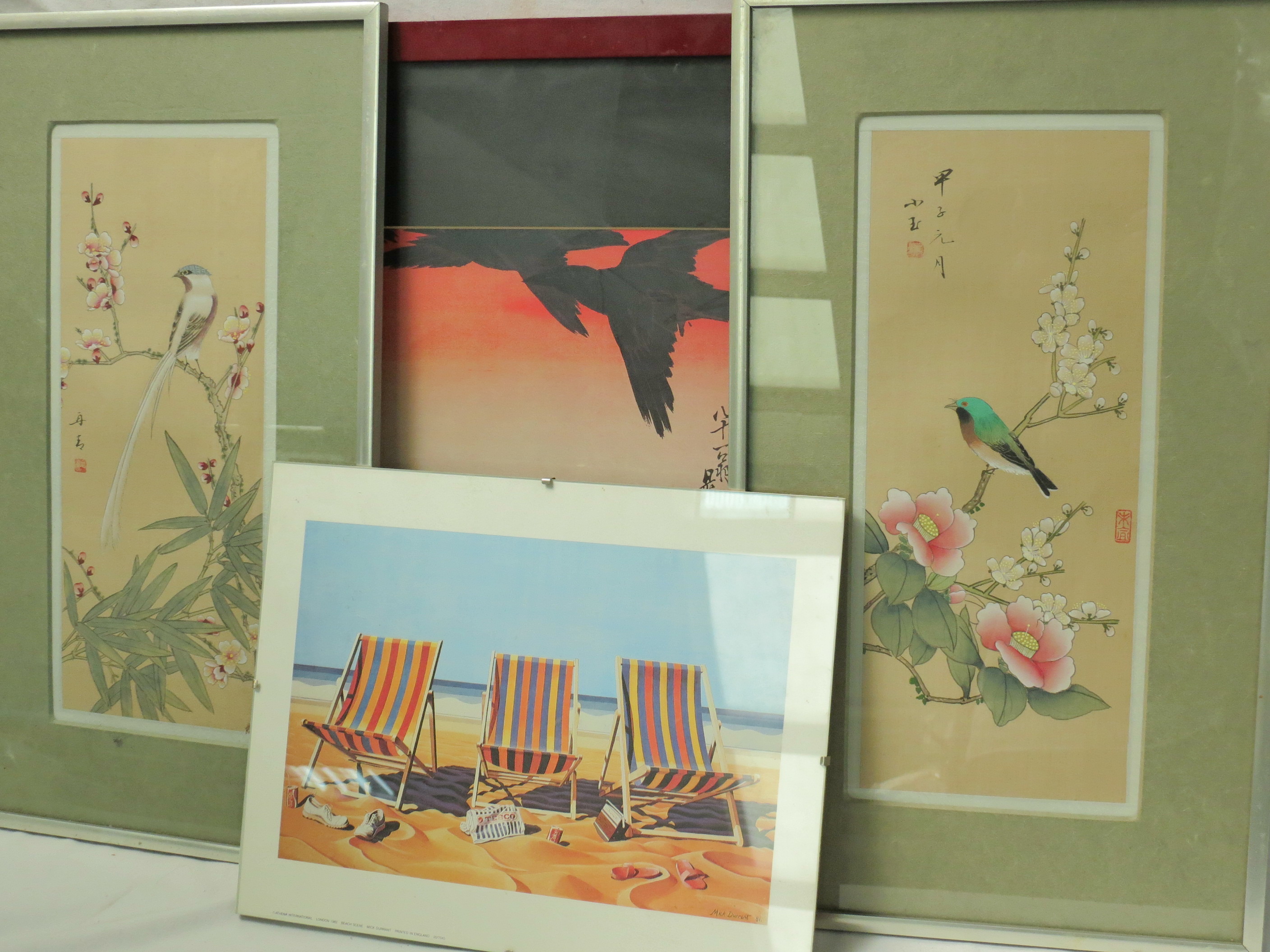 A 20thC Japanese print, an exotic bird on a flowering branch, together with another 27x15cm a pair