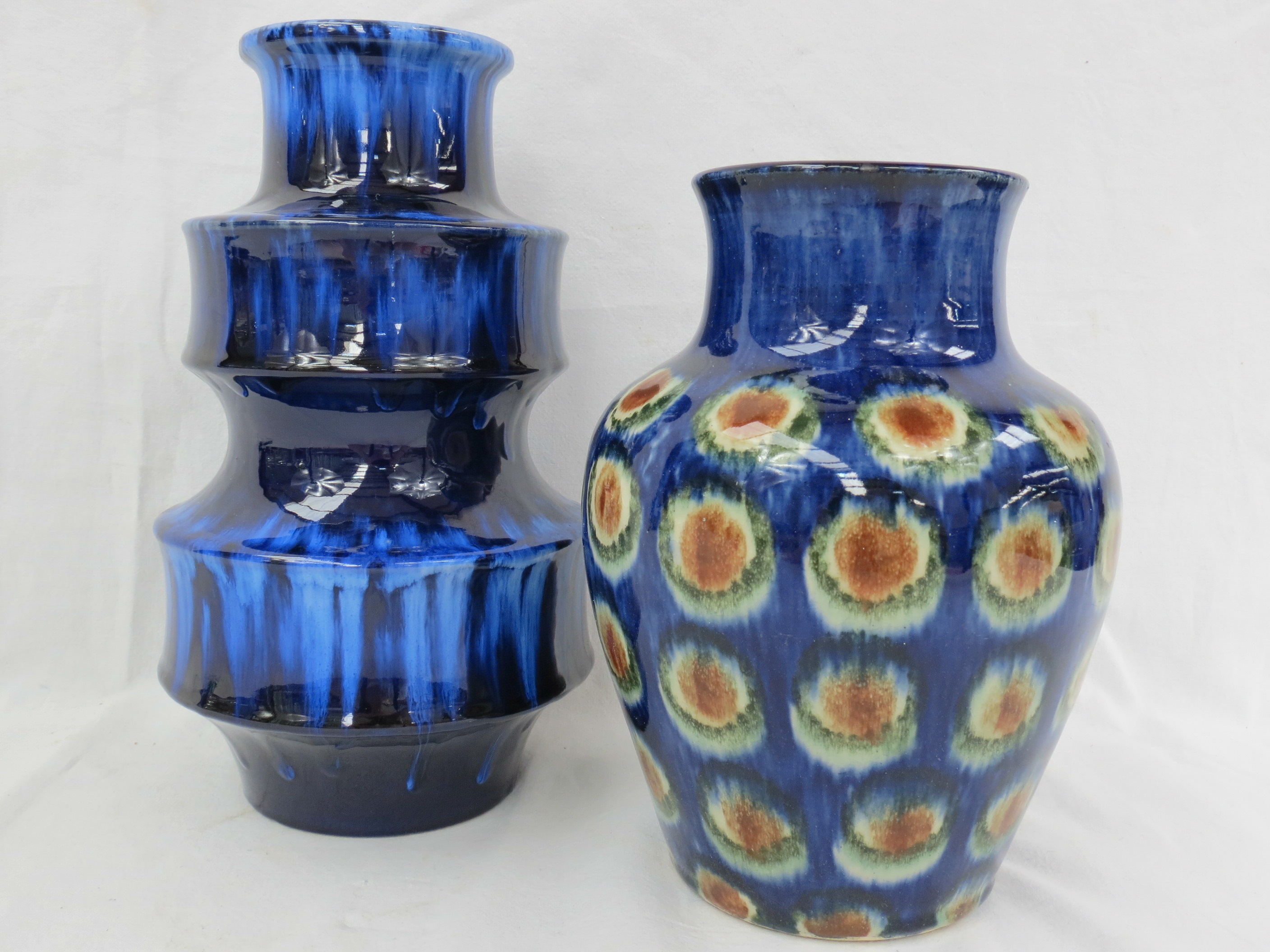 A late 20thC blue streaked glazed vase the shaped body with two broad bands, 25cm, together with a