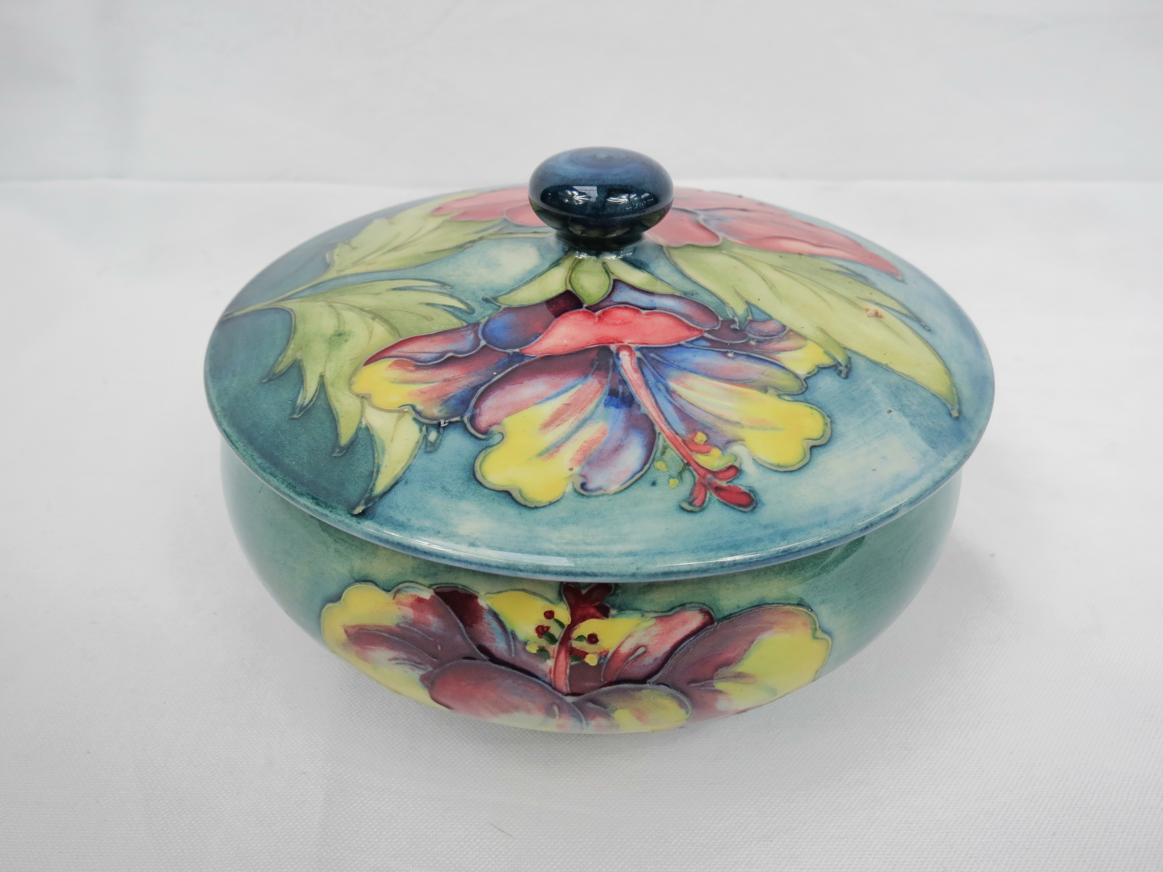 A c1960's Moorcroft hibiscus bowl and cover, 6"dia.