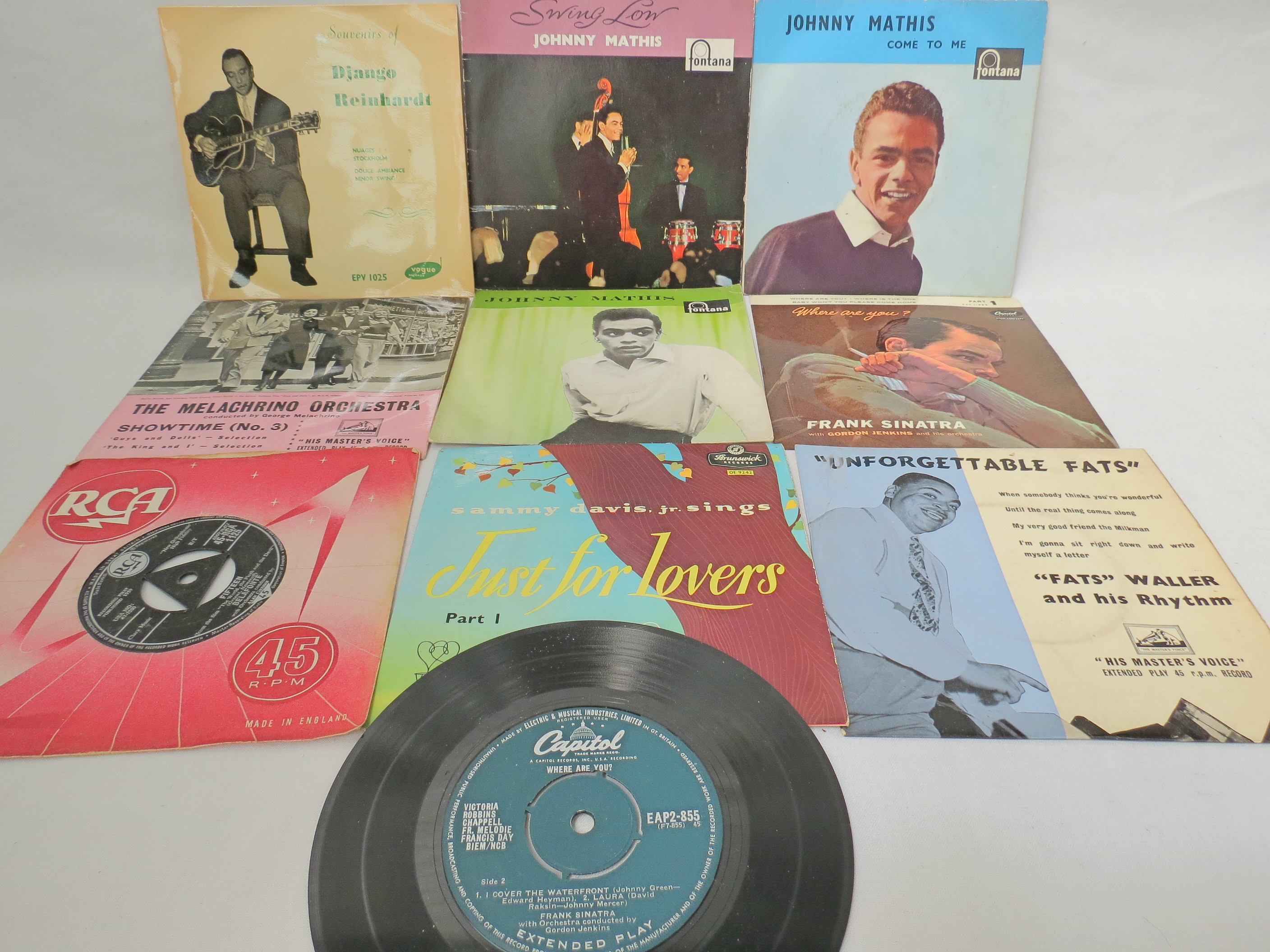 A collection of ten 45rpm gramophone records of Johnny Mathis, Frank Sinatra, Harry Belafonte,