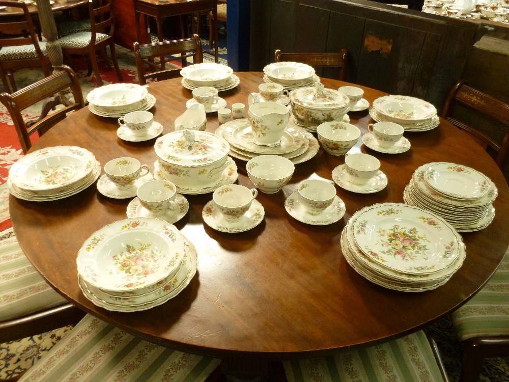 A large tea and dinner service in Kashmir design by Grindley with flower design on white ground.
