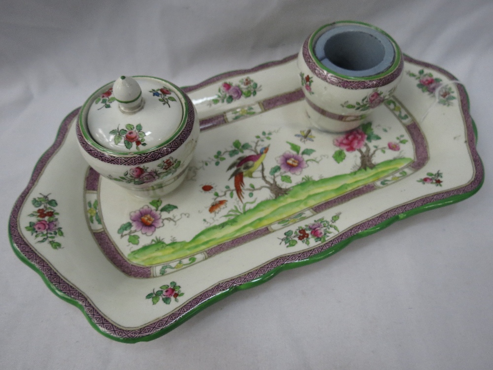 A Victorian ceramic inkwell of famille rose design by T. Goode & Co. London