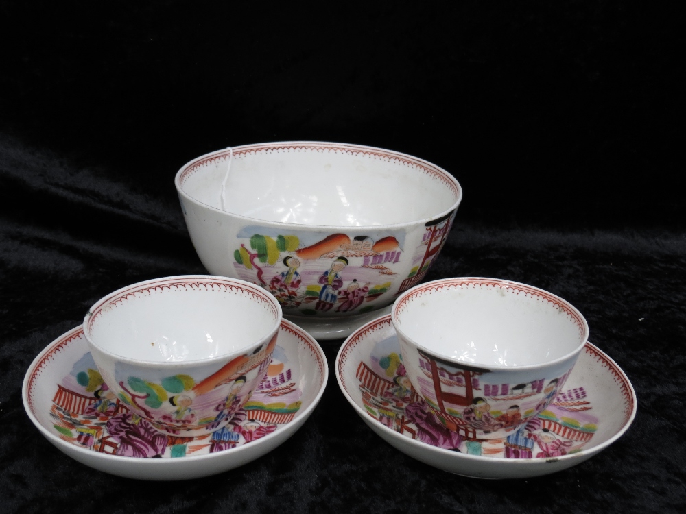 Two 18thC tea bowls, two saucers and a basin, all decorated in Chinese style, the basin bears the