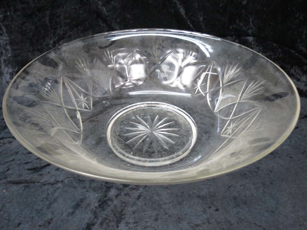 A large cut glass bowl, 16" dia, slight lip chip to rim.