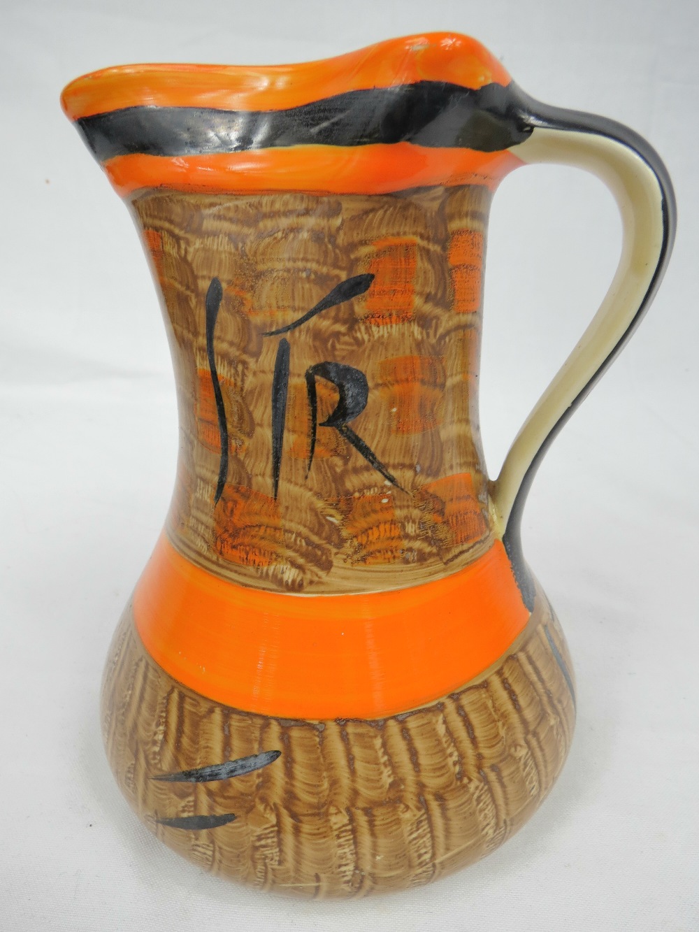 A Myott art deco pinch necked jug.