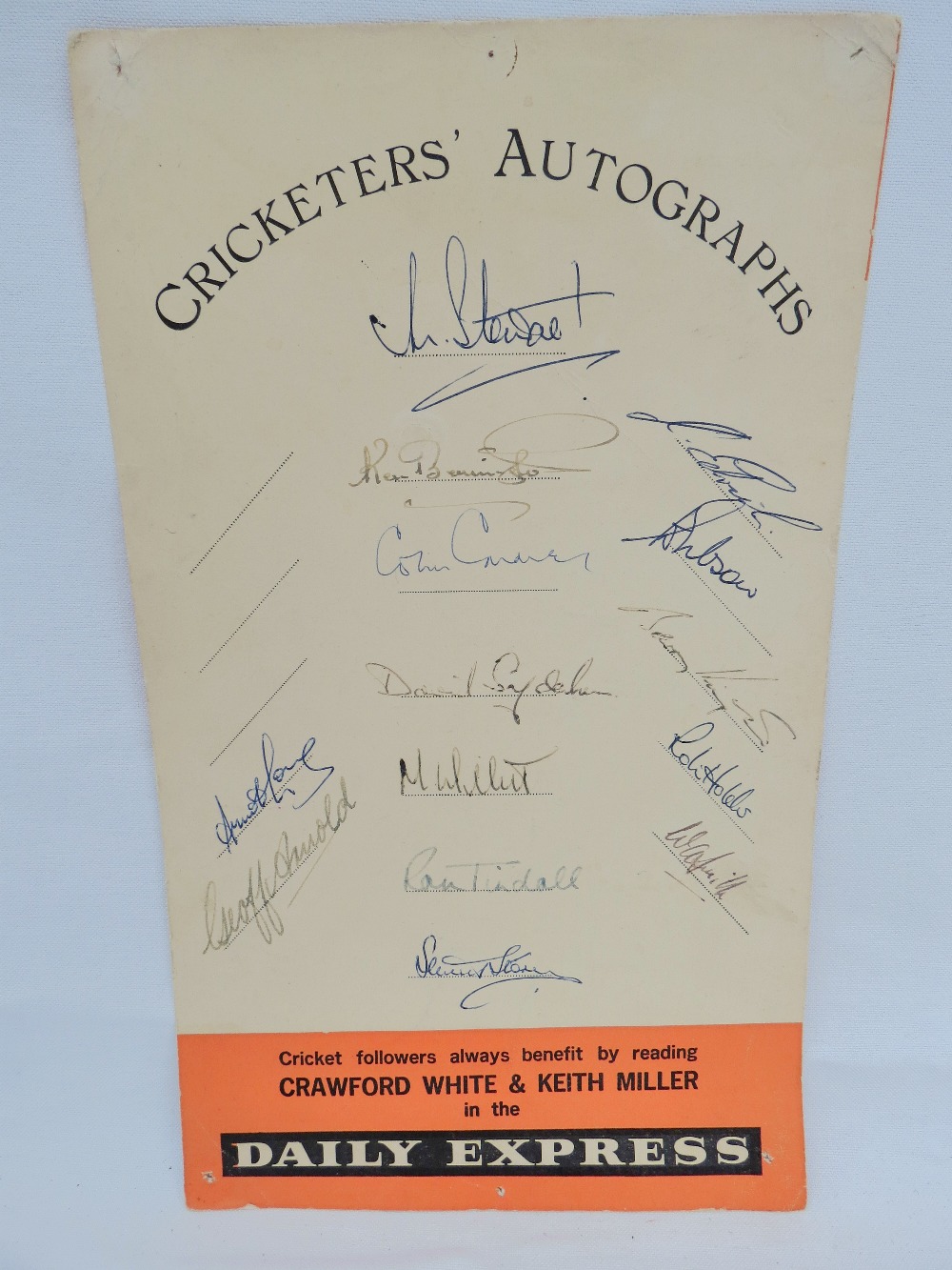 A collection of cricketers` autographs on a card advertising Crawford White and Keith Miller`s