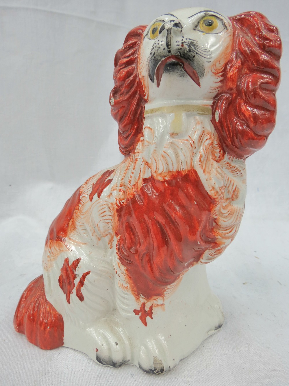 A Staffordshire spaniel looking right, 7".