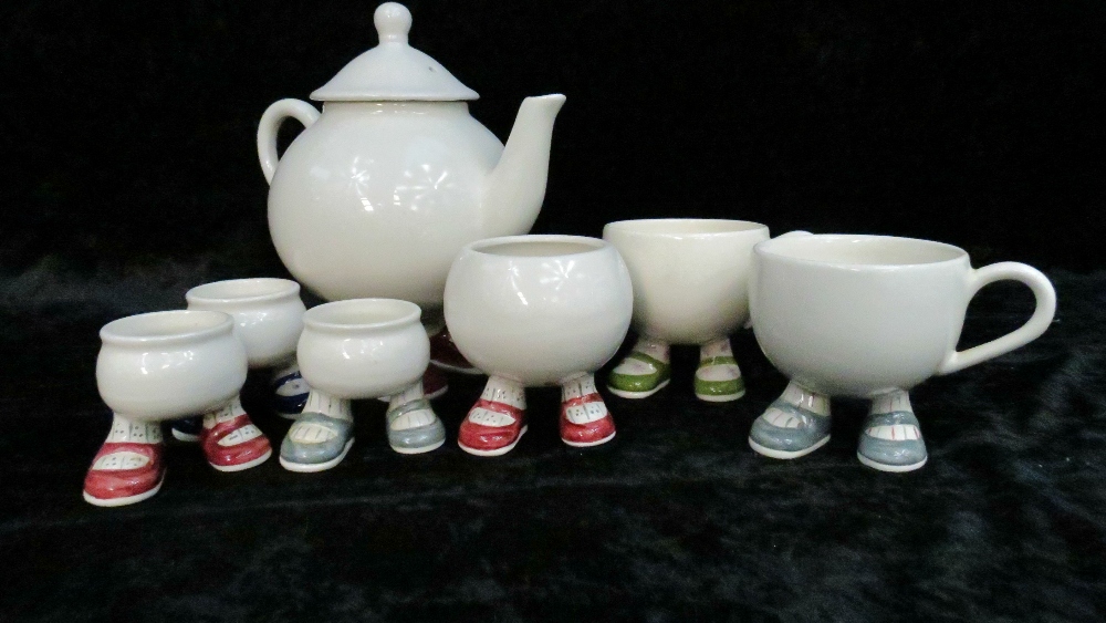 A 1970s walking ware part tea set by Carltonware comprising tea pot, sugar basin, two tea cups and