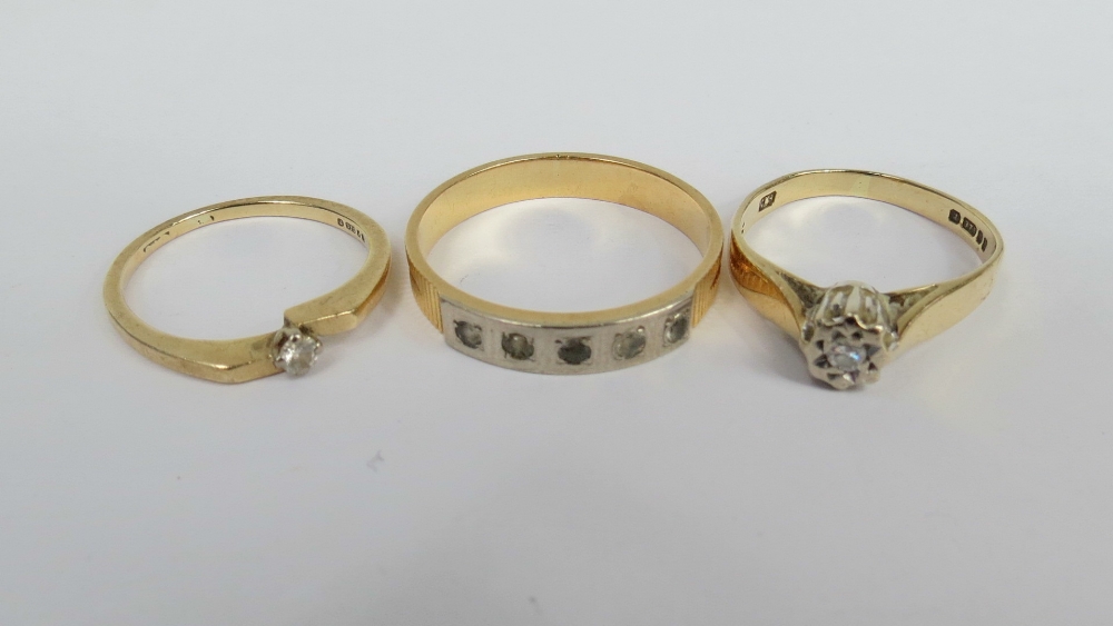 Three rings: two 9ct single stone diamonds and one white stone half eternity ring, unmarked.