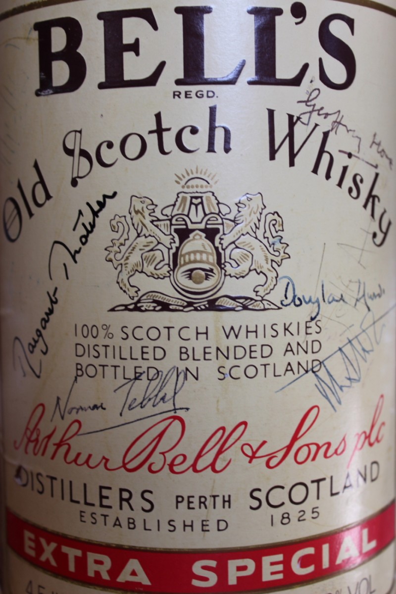Margaret Thatcher interest: a large bottle of Bell`s Old Scotch Whisky, the label signed by Margaret