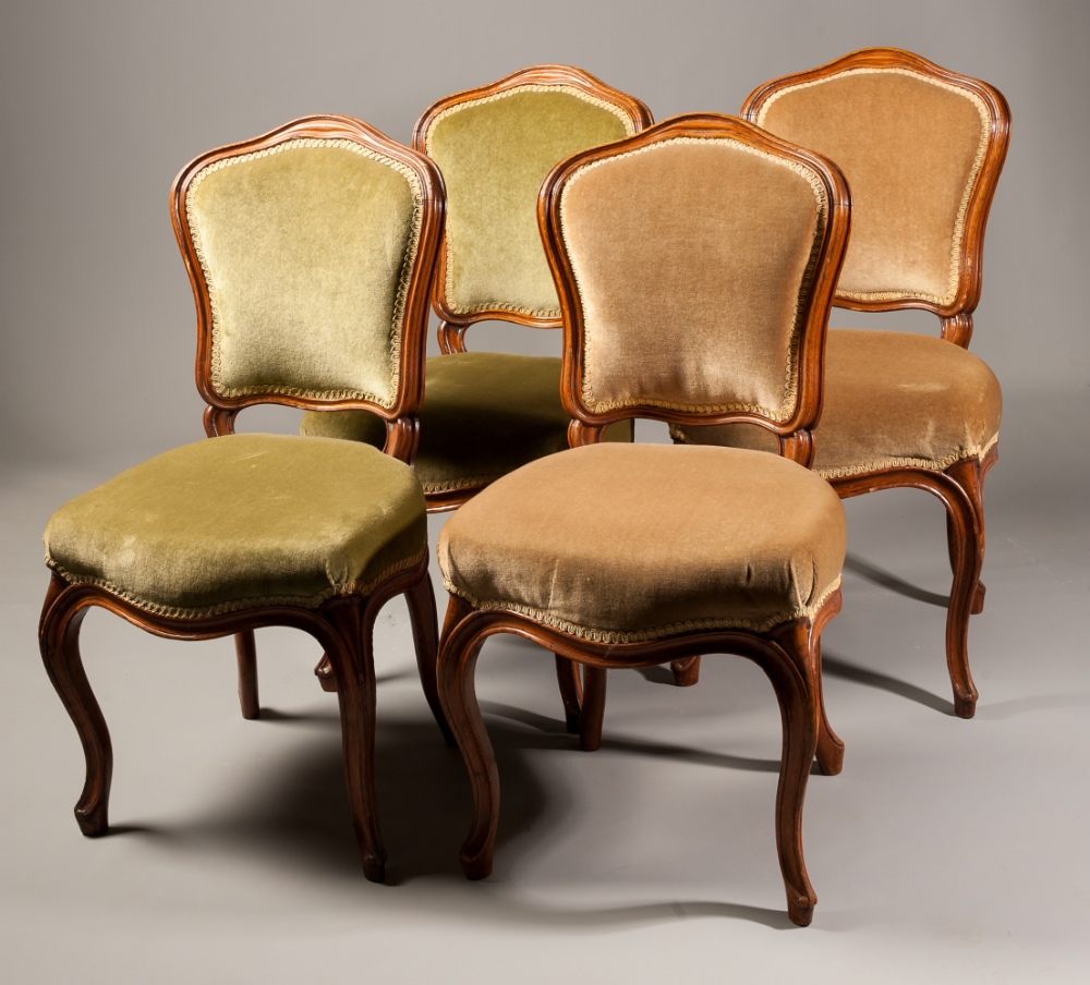 Four Victorian carved oak salon chairs in the Louis XV style, with moulded show frames. (4)