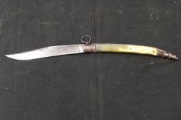 A large French folding pocket knife, 20cm blade with clipped back point etched with scrolling