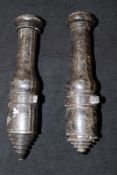 A pair of turned stone Chinese firework holders in the form of cannon. (2)